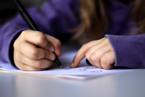A-kid-drawing-or-writing